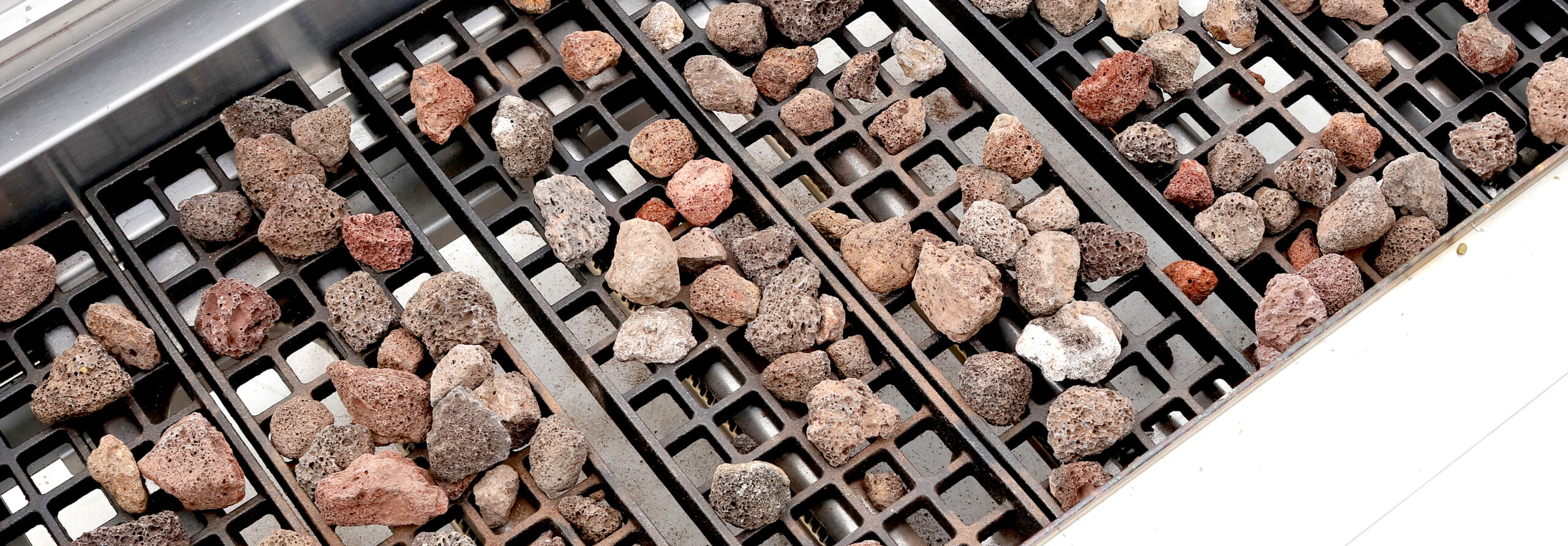 Lava rocks on Atosa commercial grill